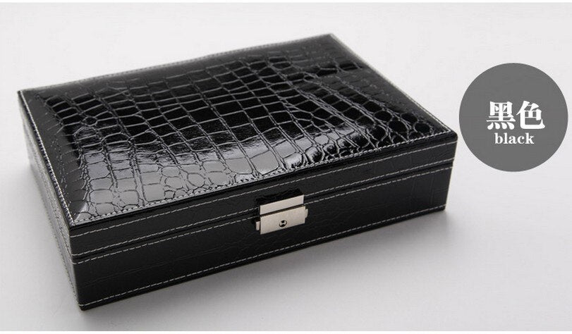 Embossed Leather Jewelry Box. Beautifully crafted from premium quality leather, this piece is perfect for storing and displaying your precious jewelry. Built-in mirror.