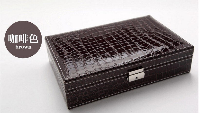 Embossed Leather Jewelry Box. Beautifully crafted from premium quality leather, this piece is perfect for storing and displaying your precious jewelry. Built-in mirror.