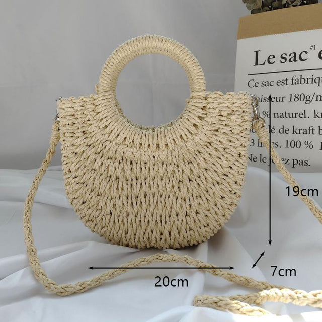 Half Moon Handmade Straw Handbags. These beautiful bags are woven by hand and feature a unique moon-shaped top handle.