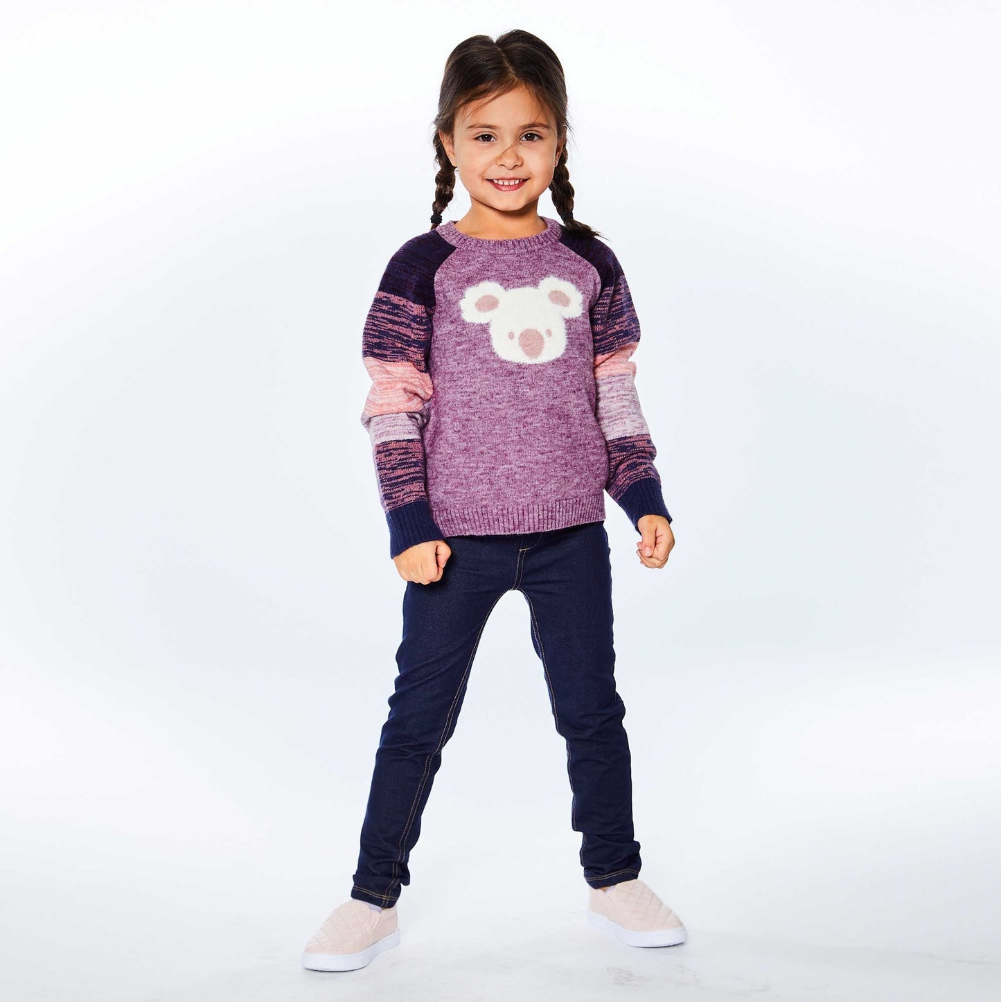 The Long Sleeve Knitted Koala Sweater features long raglan sleeves with space dyed stripes, a crew neckline, and a solid body with an adorable koala face on the front.  A koala bear face on the chest makes this pullover sweater simply perfect for a chilly day! 