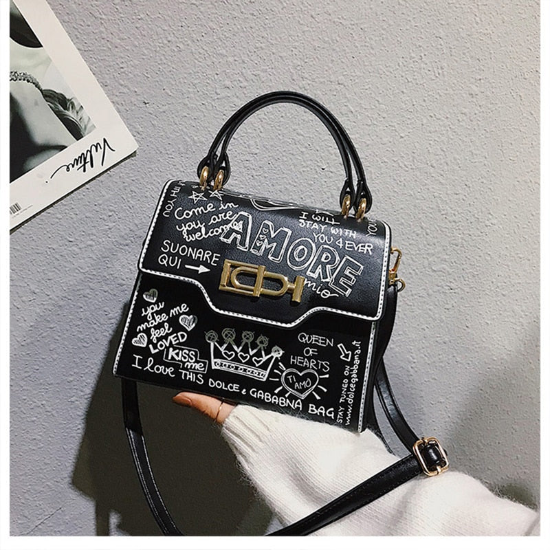 Mini Leather Graffiti HandBags. Made from high quality leather, featuring a unique graffiti design that is sure to have them asking, "Where'd you get that from?"