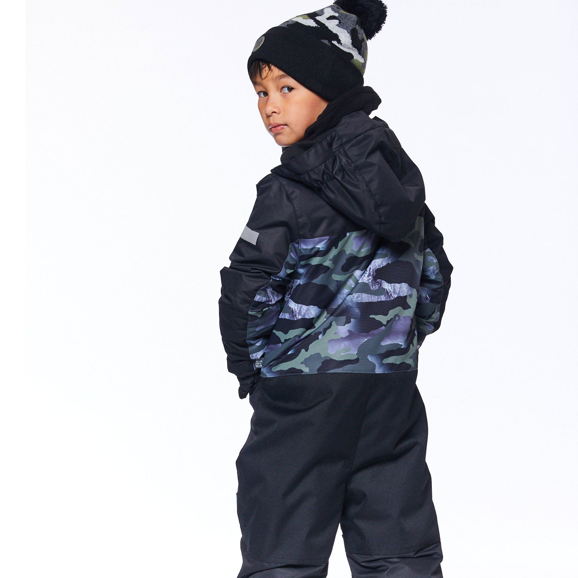 Little ones can enjoy the snow in style in our One Piece Snowsuit Printed Camo. Weather-resistant and insulated for warmth in sub-freezing temperatures.  This snowsuit features an adjustable inside waist, reinforced knees panels, rubberized elastic ankles, and a fleece lining for added warmth.