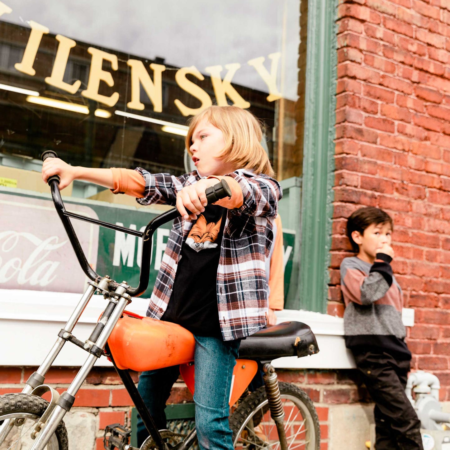 Our Plaid Shirt Brown and Black adds style and versatility to any boys wardrobe.  Worn buttoned up or open over a tee, this shirt features long sleeves, a button front placket, and two flap pockets on the chest.