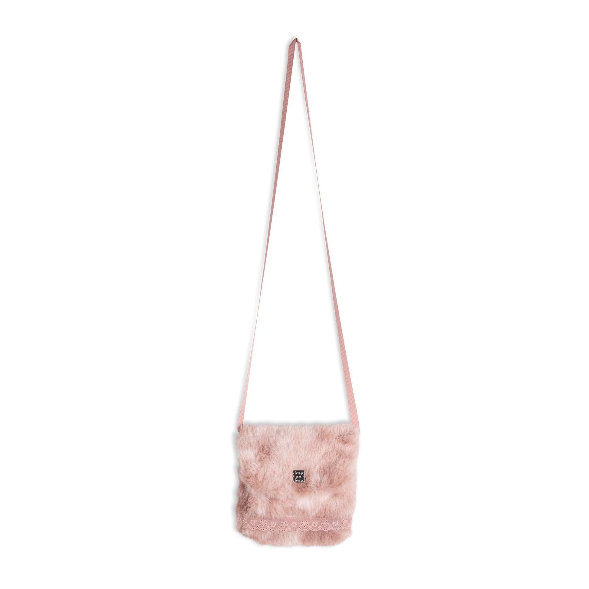 She can carry her essentials in style inside our Silver Pink Fake Fur Bag. In a chic crossbody silhouette, this petite bag is made from poly faux fur.  Features a flap front silhouette with a slim strap for easy carrying and eyelet lace trim for added texture.