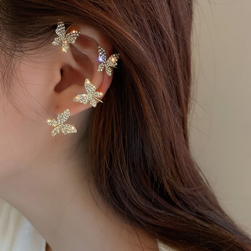 Adorn yourself with this sweetly exquisite Sparkling Butterfly Ear Clip Gold Plated. Great option. Welcome addition to any jewelry box. Zircon crystals