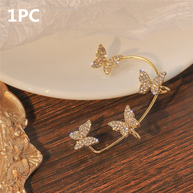 Adorn yourself with this sweetly exquisite Sparkling Butterfly Ear Clip Gold Plated. Great option. Welcome addition to any jewelry box. Zircon crystals