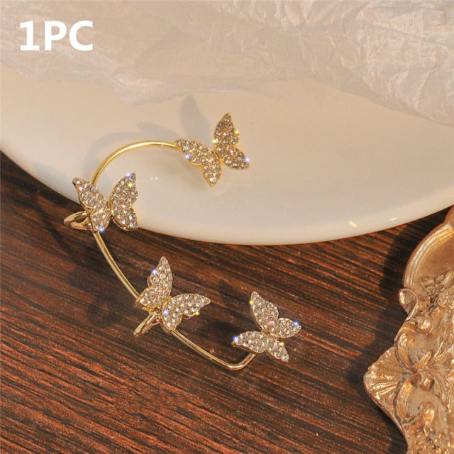 Adorn yourself with this sweetly exquisite Sparkling Butterfly Ear Clip Gold Plated. Great option. Welcome addition to any jewelry box. Zircon crystals