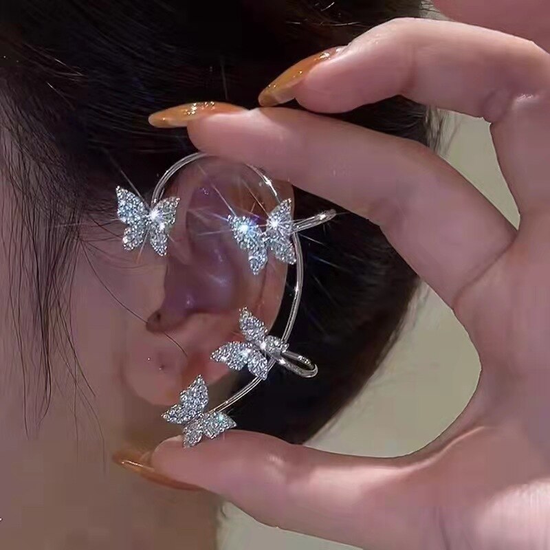 Adorn yourself with this sweetly exquisite Sparkling Butterfly Ear Clip Gold Plated. Great option. Welcome addition to any jewelry box. Zircon crystals